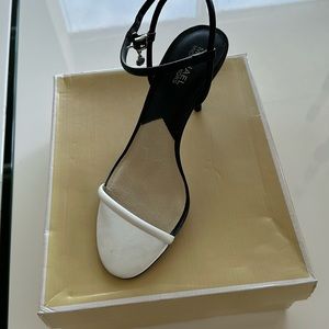 Beautiful black and white it has about a 3 inch heel